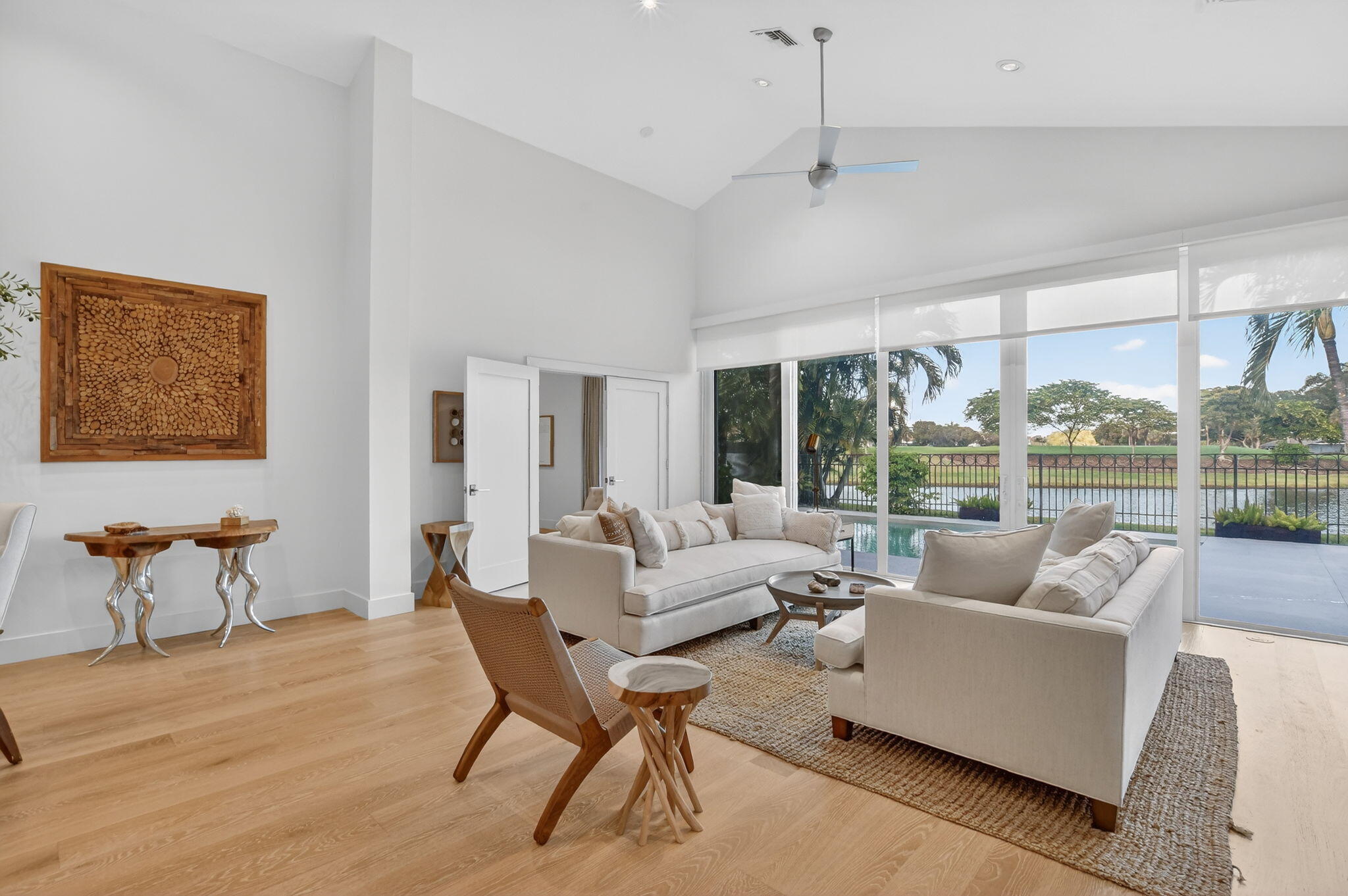 2051 Northwest 56th Street Boca Raton, FL 33496 - Photo 10 of 58 a living room with furniture and a large window