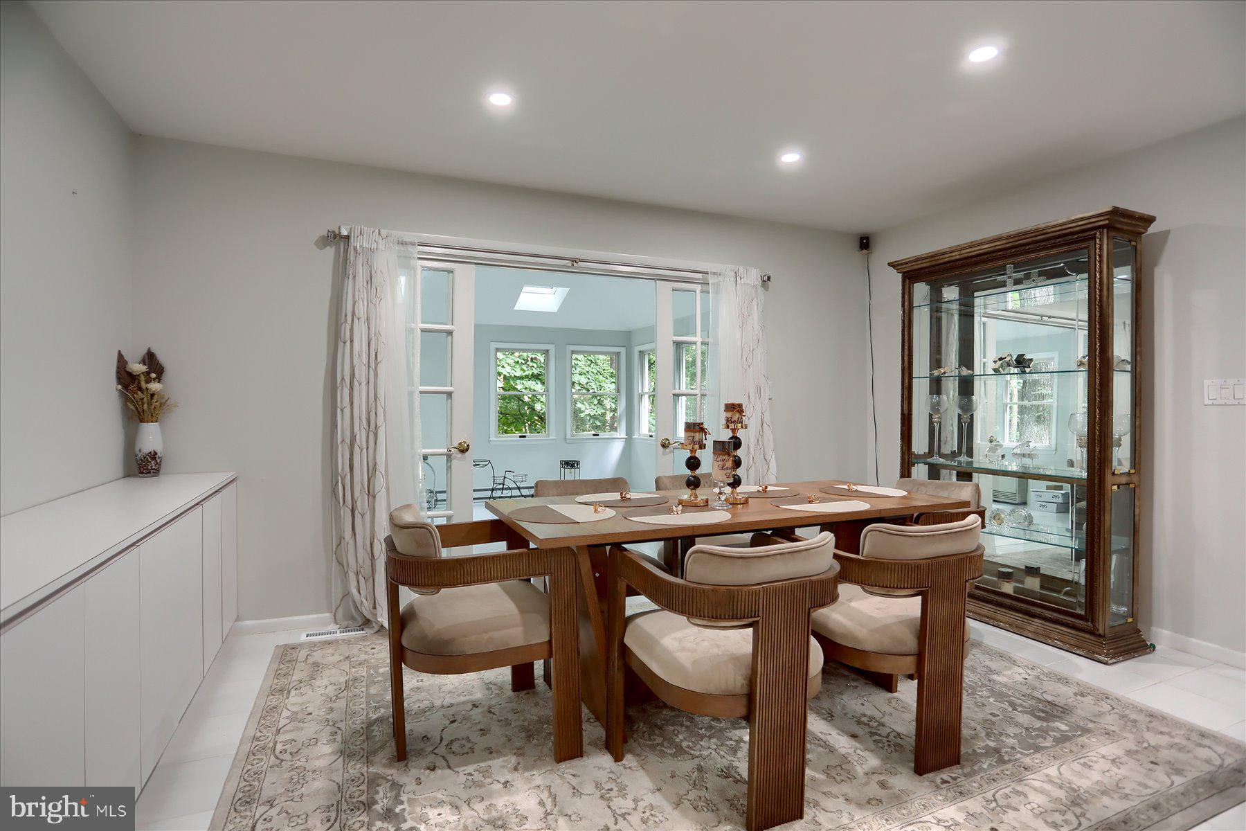 10902 Baronet Road Owings Mills, MD 21117 - Photo 18 of 42 a dining room with furniture and window