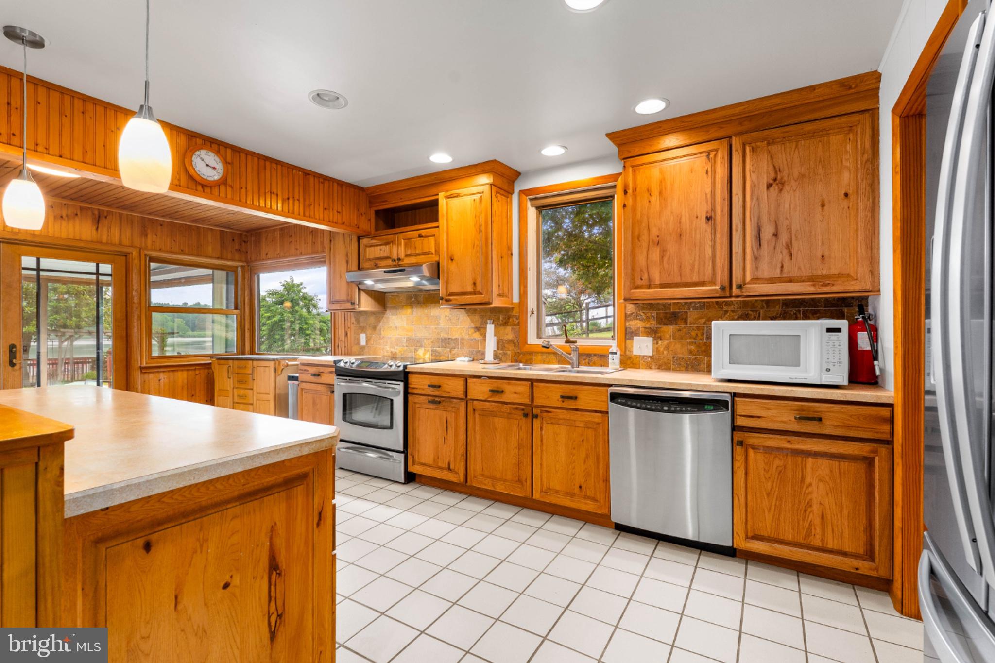 64 South Shore Road Elkton, MD 21921 - Photo 6 of 36 Warm wood tones in a bright kitchen.