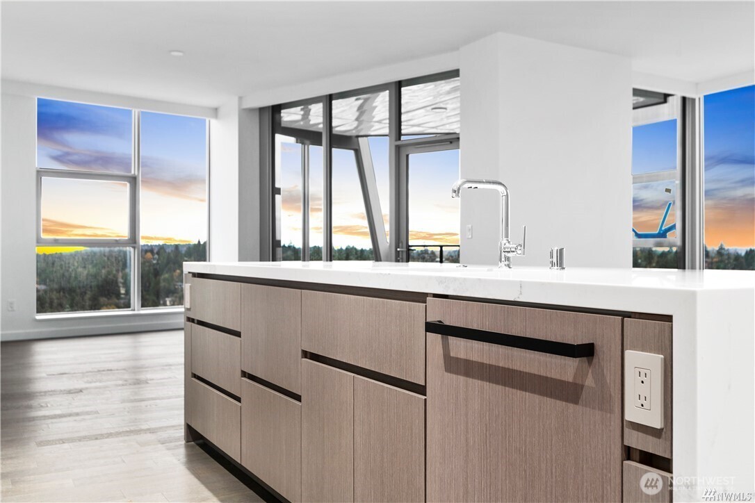 188 Bellevue Way Northeast, Unit 1907 Bellevue, WA 98004 - Photo 12 of 36 a bathroom with a double vanity sink and mirror
