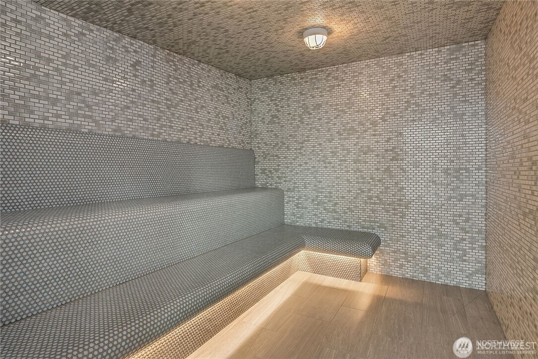 188 Bellevue Way Northeast, Unit 1907 Bellevue, WA 98004 - Photo 23 of 36 a view of a bathtub in a bathroom