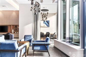 188 Bellevue Way Northeast, Unit 1907 Bellevue, WA 98004 - Photo 28 of 36 a living room with furniture and a window