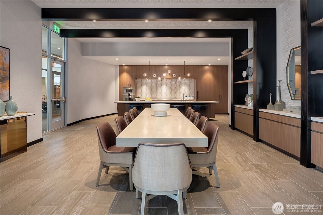 188 Bellevue Way Northeast, Unit 1907 Bellevue, WA 98004 - Photo 30 of 36 a view of a dining room with furniture and wooden floor