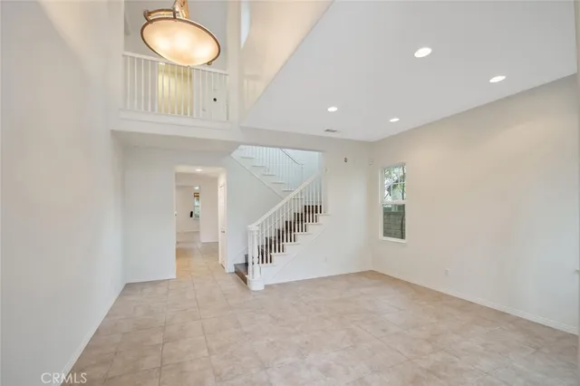a view of an entryway with stairs