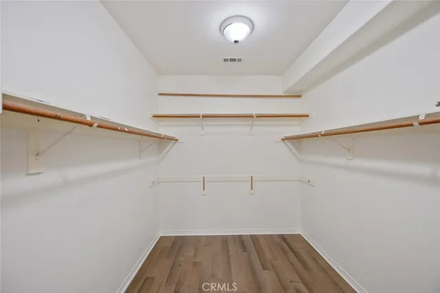 a view of a room with racks on the wall