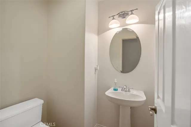 a bathroom with a sink and a toilet
