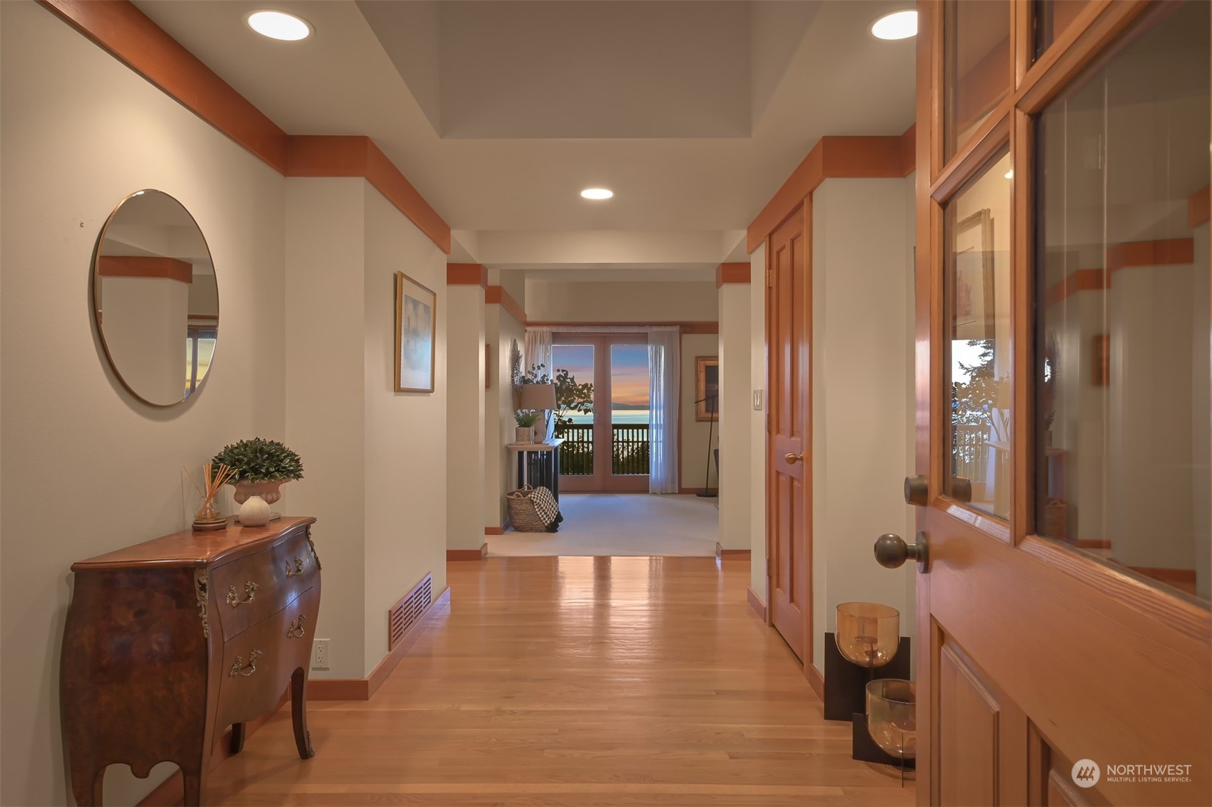 608 Clark Road Bellingham, WA 98225 - Photo 11 of 40 a view of a hallway to dining room with furniture and wooden floor
