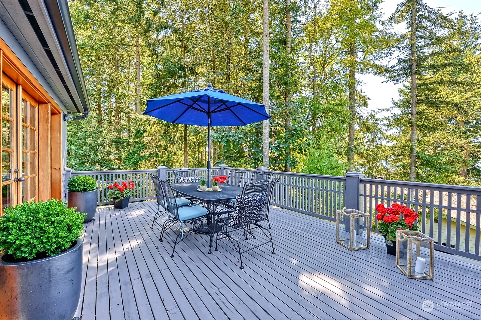 608 Clark Road Bellingham, WA 98225 - Photo 17 of 40 a view of deck with furniture and umbrella