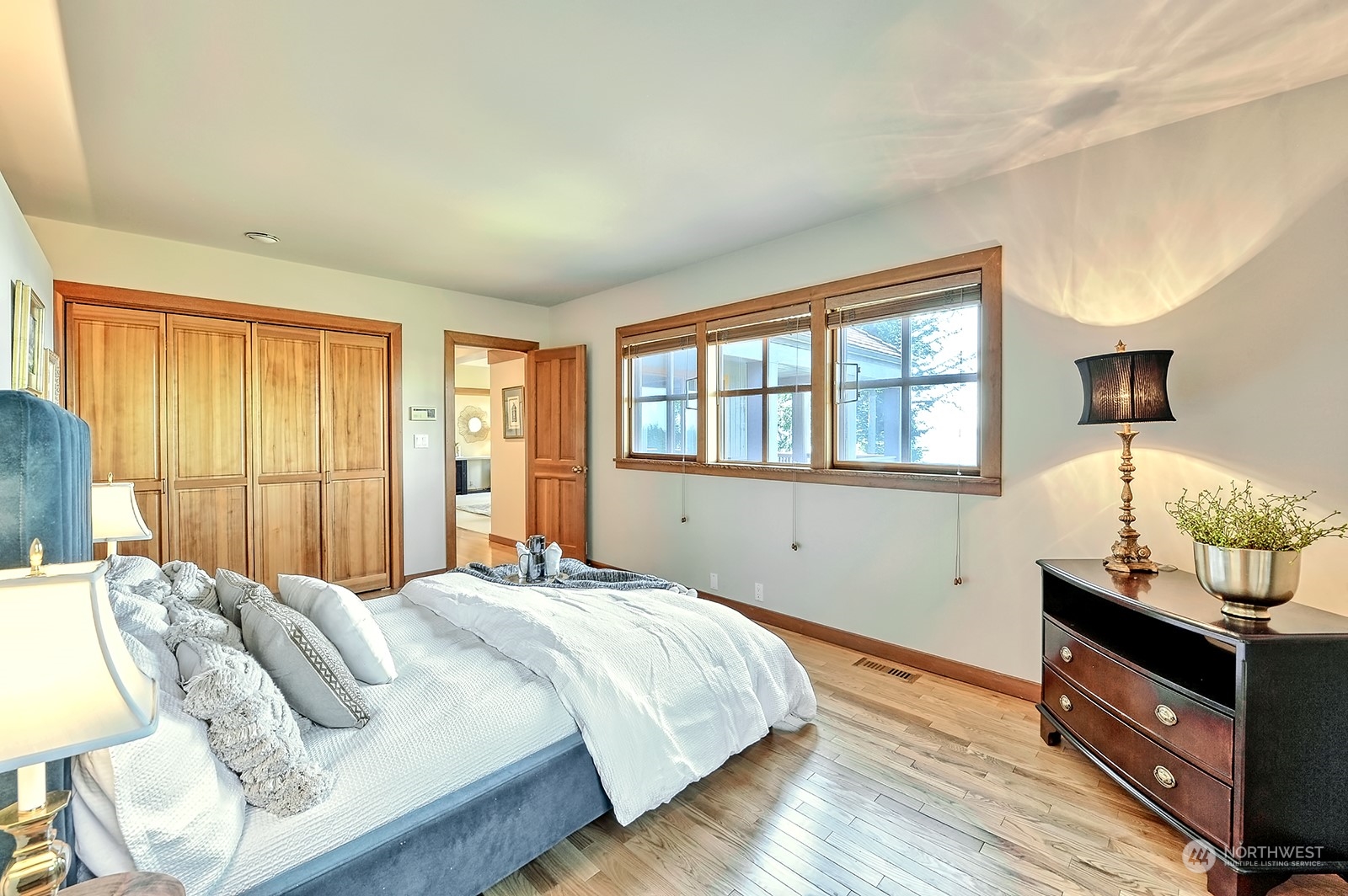 608 Clark Road Bellingham, WA 98225 - Photo 24 of 40 a bedroom with a bed and wooden floor