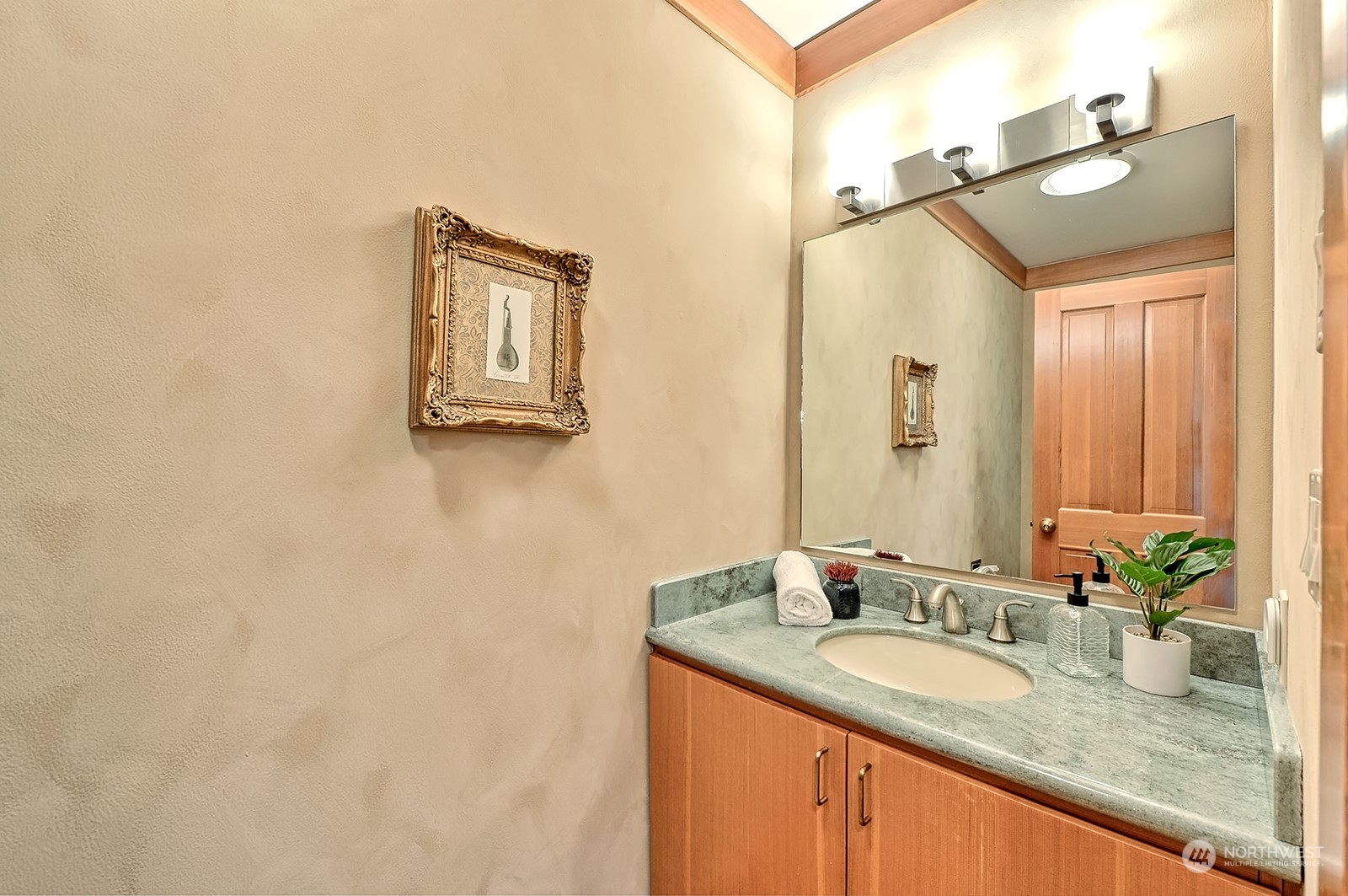 608 Clark Road Bellingham, WA 98225 - Photo 28 of 40 a bathroom with a granite countertop sink and a mirror