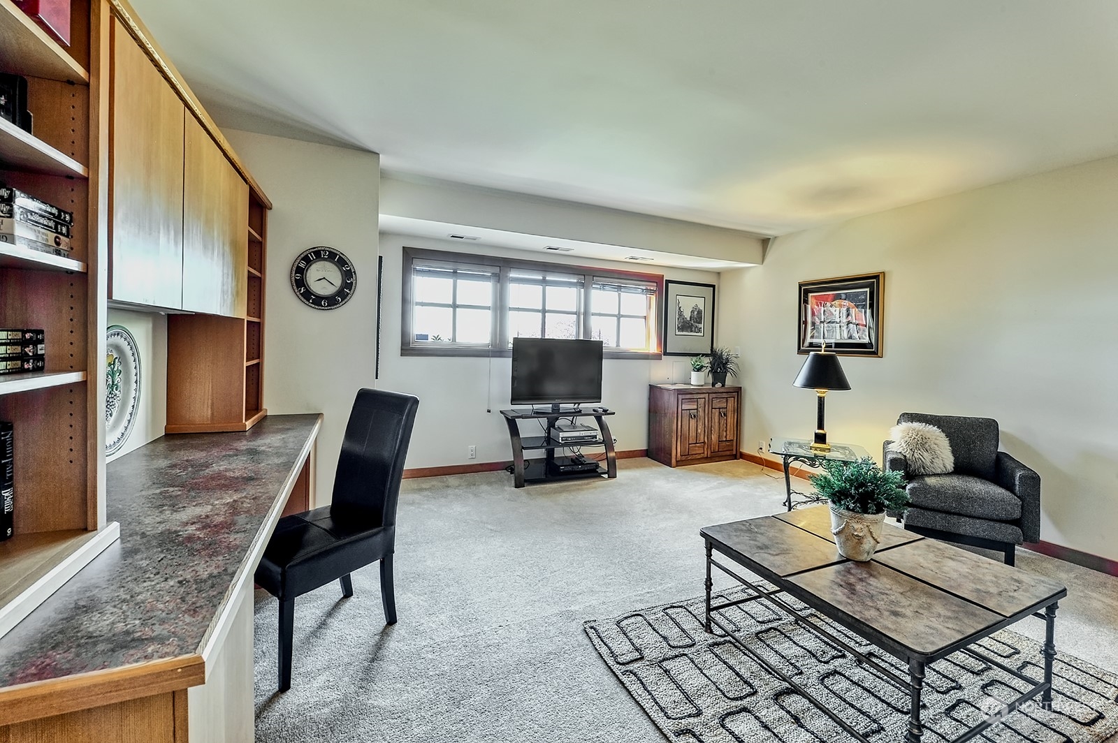 608 Clark Road Bellingham, WA 98225 - Photo 31 of 40 a living room with furniture and a flat screen tv