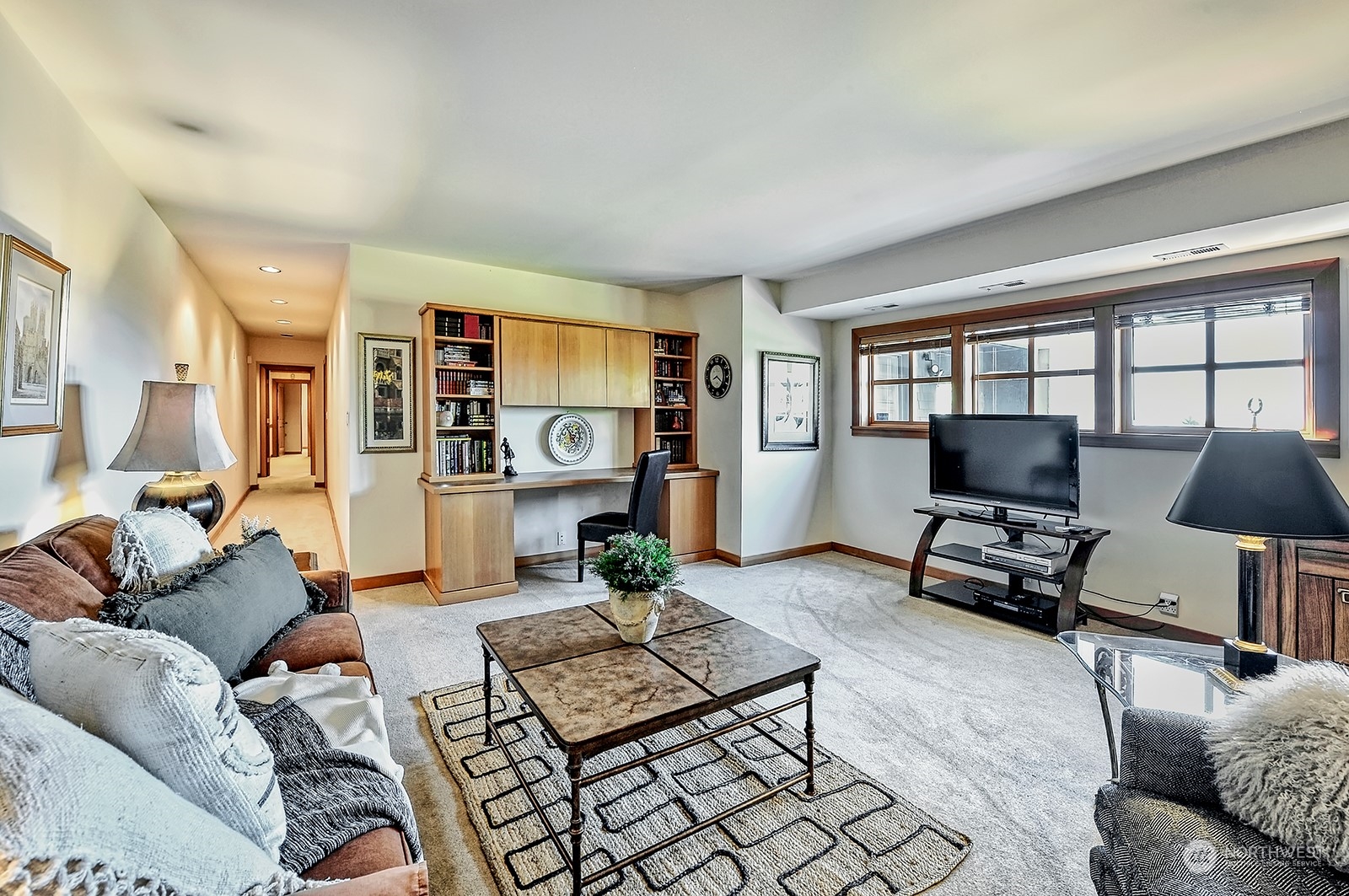 608 Clark Road Bellingham, WA 98225 - Photo 32 of 40 a living room with furniture and a flat screen tv