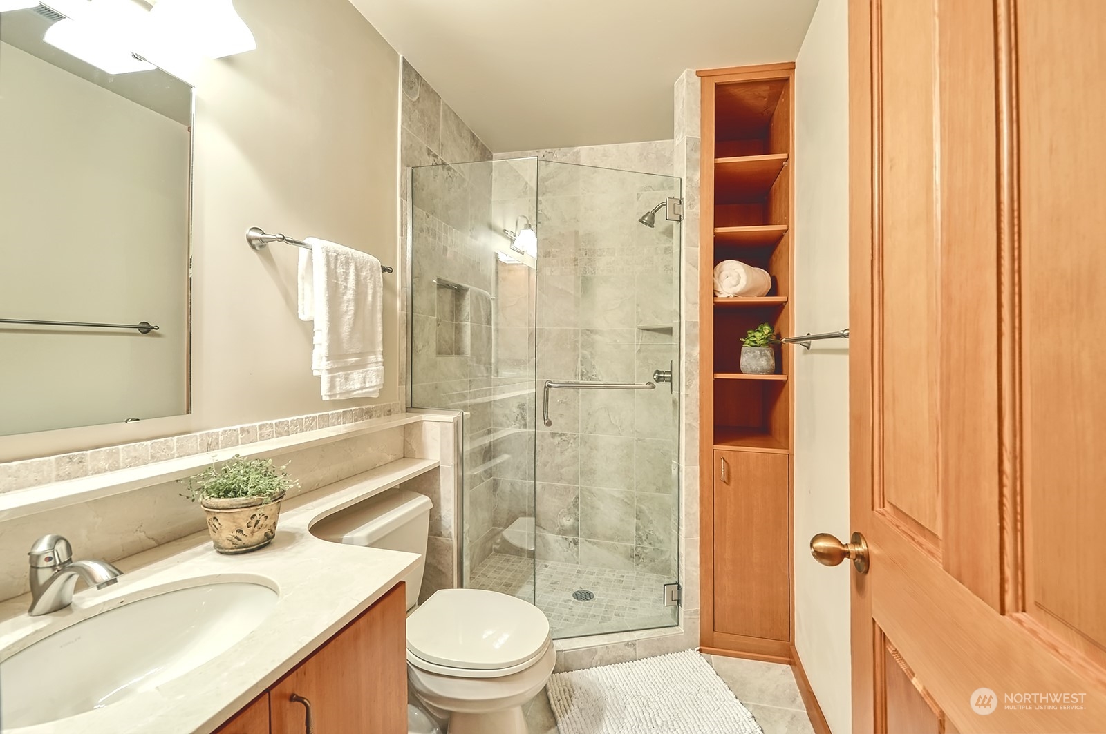 608 Clark Road Bellingham, WA 98225 - Photo 35 of 40 a bathroom with a granite countertop sink toilet and shower