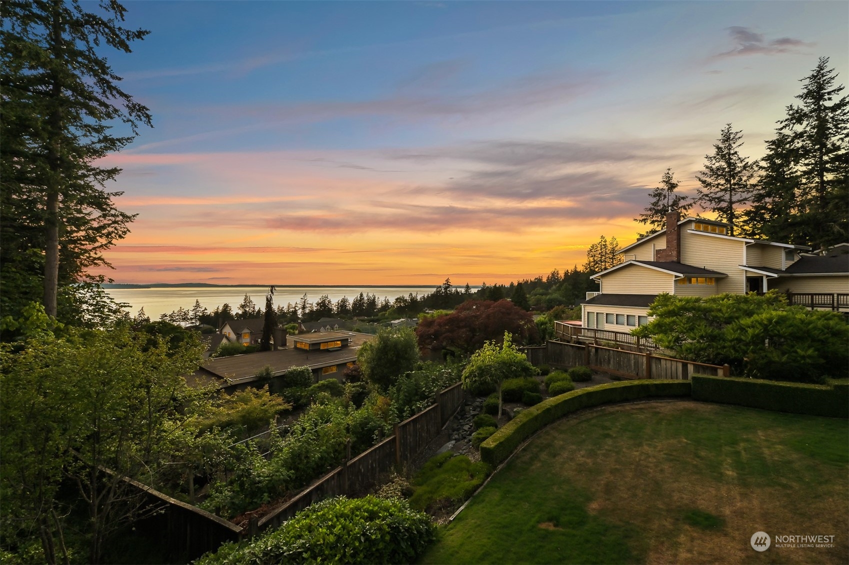 608 Clark Road Bellingham, WA 98225 - Photo 5 of 40 a view of a garden with a lake