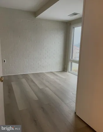 a kitchen with a refrigerator a stove top oven and a dishwasher