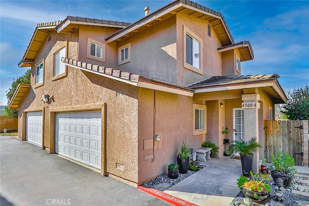 4500 Apricot Road, Unit A Simi Valley, CA 93063 - Photo 1 of 1 a front view of a house with a yard