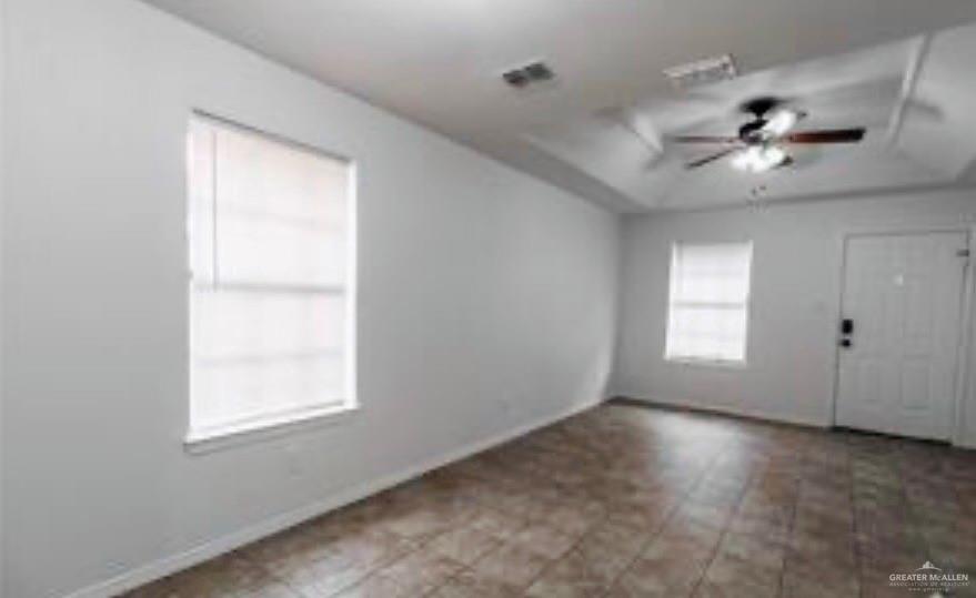 241 East 19th Street, Unit 3 Weslaco, TX 78596 - Photo 3 of 10 a view of an empty room with a window