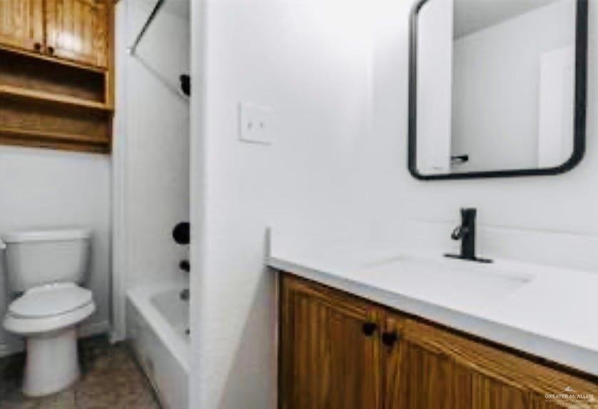 241 East 19th Street, Unit 3 Weslaco, TX 78596 - Photo 7 of 10 a bathroom with a toilet sink and mirror