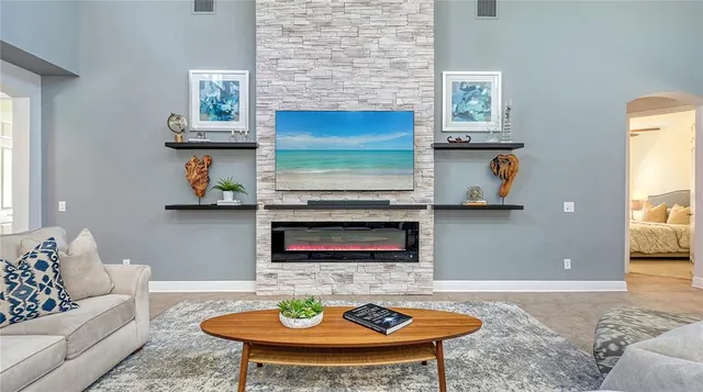 a kitchen with stainless steel appliances a sink stove and cabinets