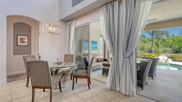 a bedroom with a bed chair and a window