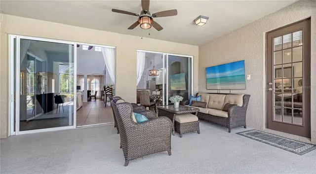 a bathroom with a granite countertop shower a mirror and a sink