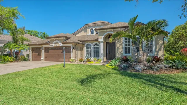 a view of a livingroom with furniture and a chandelier