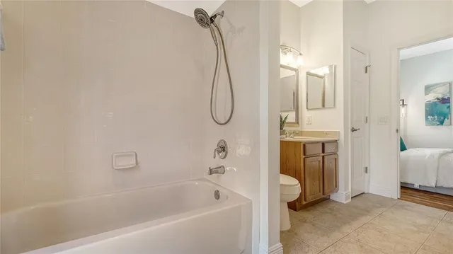 a front view of a house with garden and porch