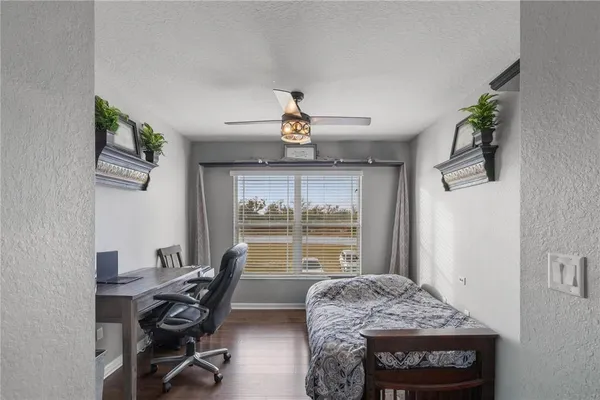 a workspace with furniture and window