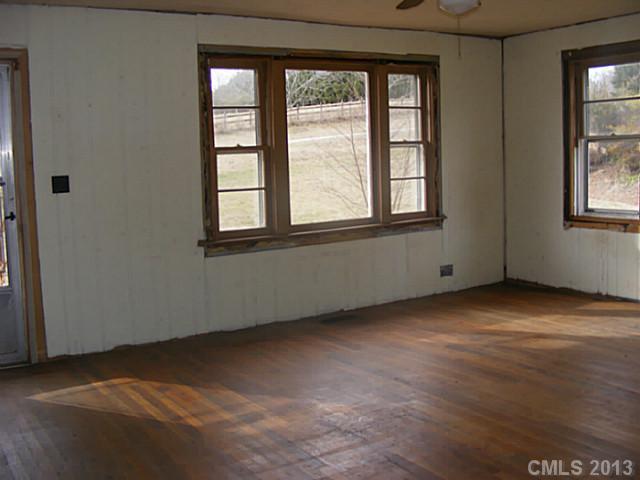 1739 Goble Road Hiddenite, NC 28636 - Photo 3 of 3 a view of an empty room with a window