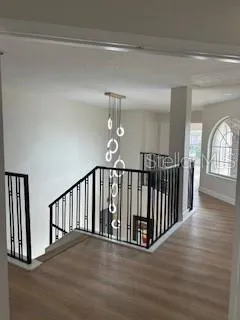 a bathroom with a shower and a sink