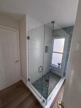 a bathroom with a sink and mirror