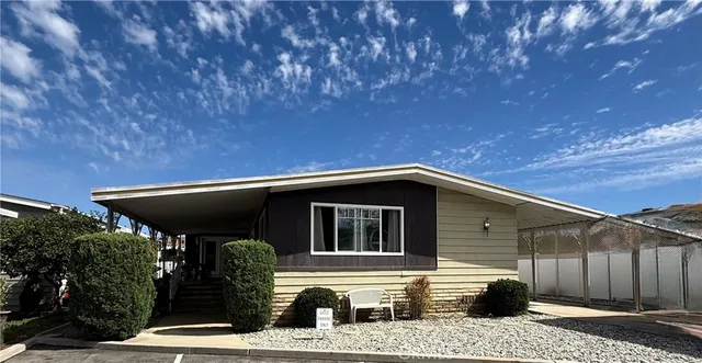 a front view of a house with garage
