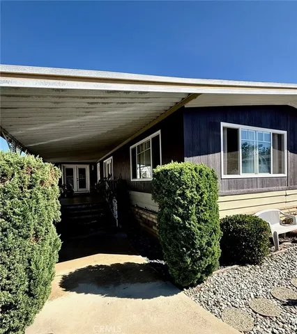 a view of house with outdoor space