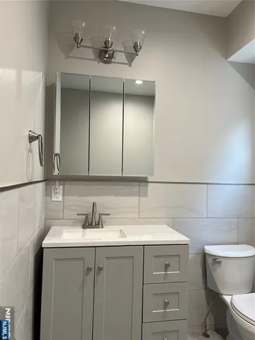a bathroom with a sink and a toilet