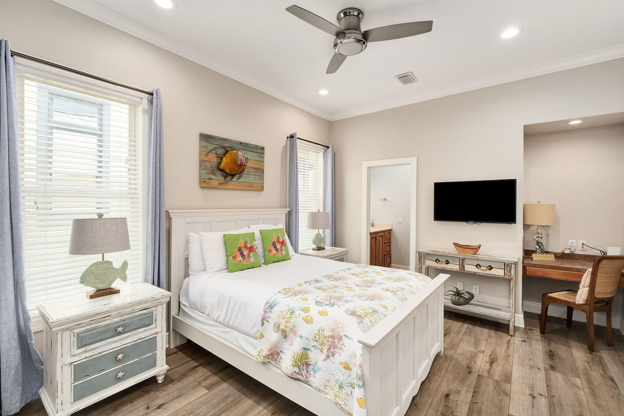 226 Sandtrap Road Miramar Beach, FL 32550 - Photo 13 of 15 a bedroom with a bed and flat screen tv