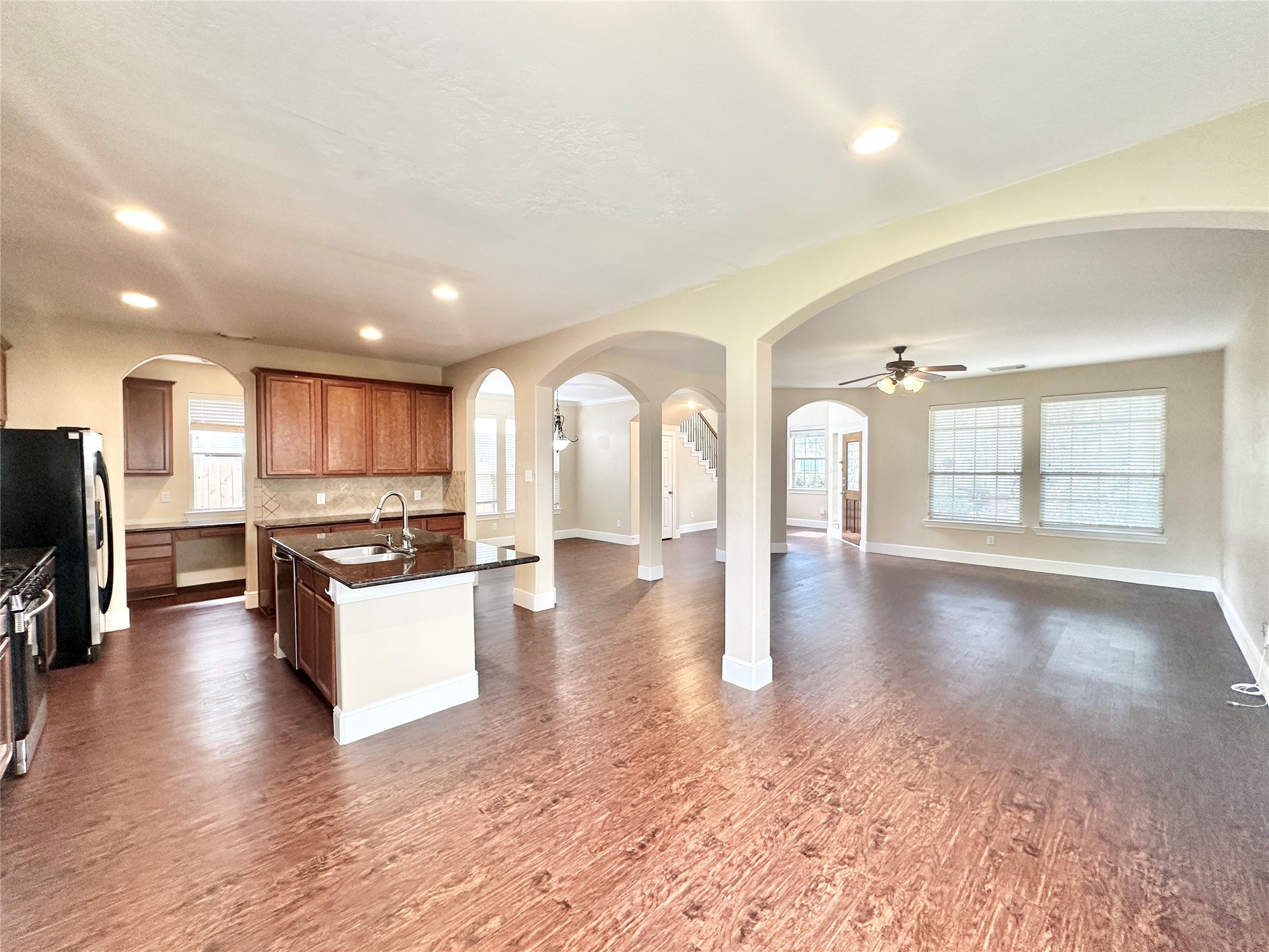 43 Panterra Way Spring, TX 77382 - Photo 8 of 17 a view of a living room filled with furniture and a flat screen tv