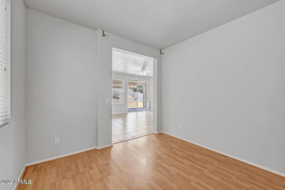 6410 West Hackamore Drive Phoenix, AZ 85083 - Photo 29 of 50 wooden floor in an empty room