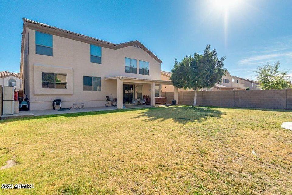 6410 West Hackamore Drive Phoenix, AZ 85083 - Photo 3 of 50 a view of house with a yard