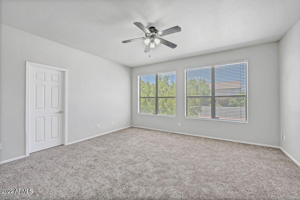 6410 West Hackamore Drive Phoenix, AZ 85083 - Photo 33 of 50 a view of an empty room with a window