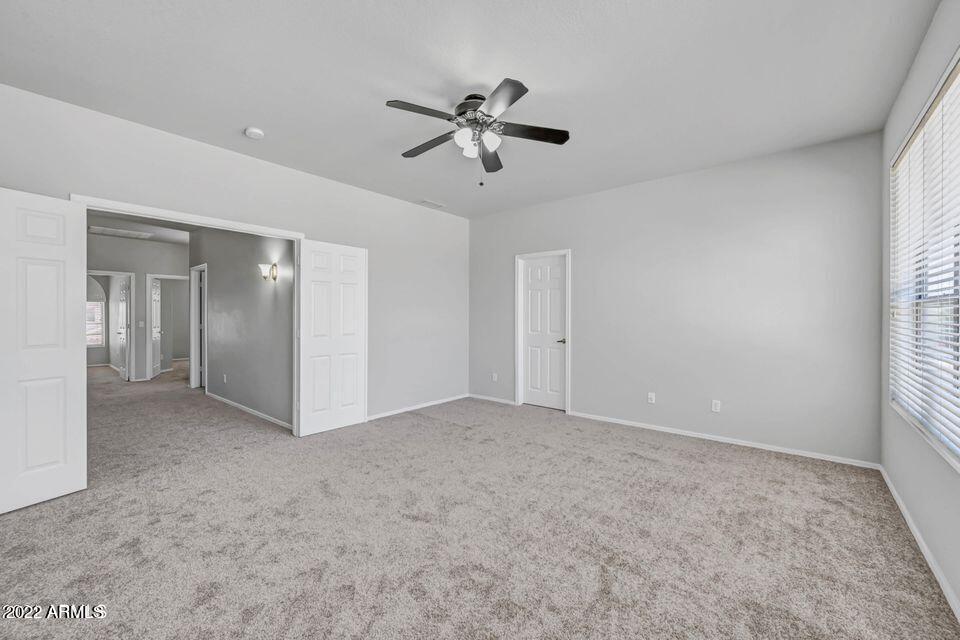 6410 West Hackamore Drive Phoenix, AZ 85083 - Photo 34 of 50 a view of an empty room with a window