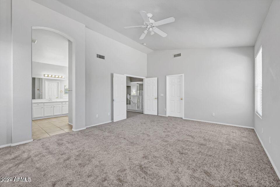 6410 West Hackamore Drive Phoenix, AZ 85083 - Photo 45 of 50 an empty room with fan and entrance