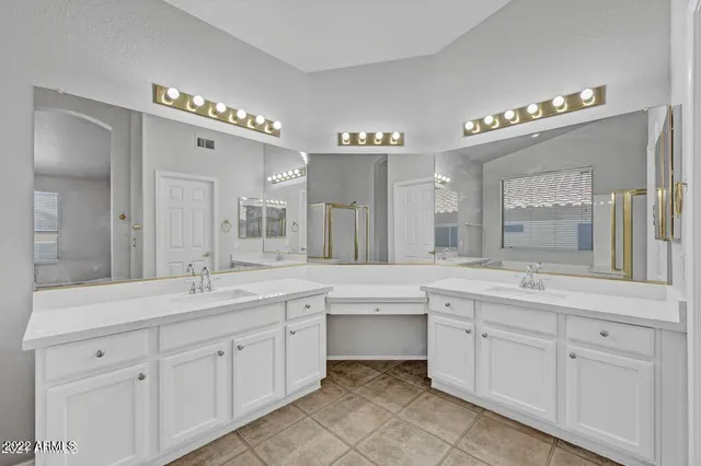 a white bath tub sitting next to a window