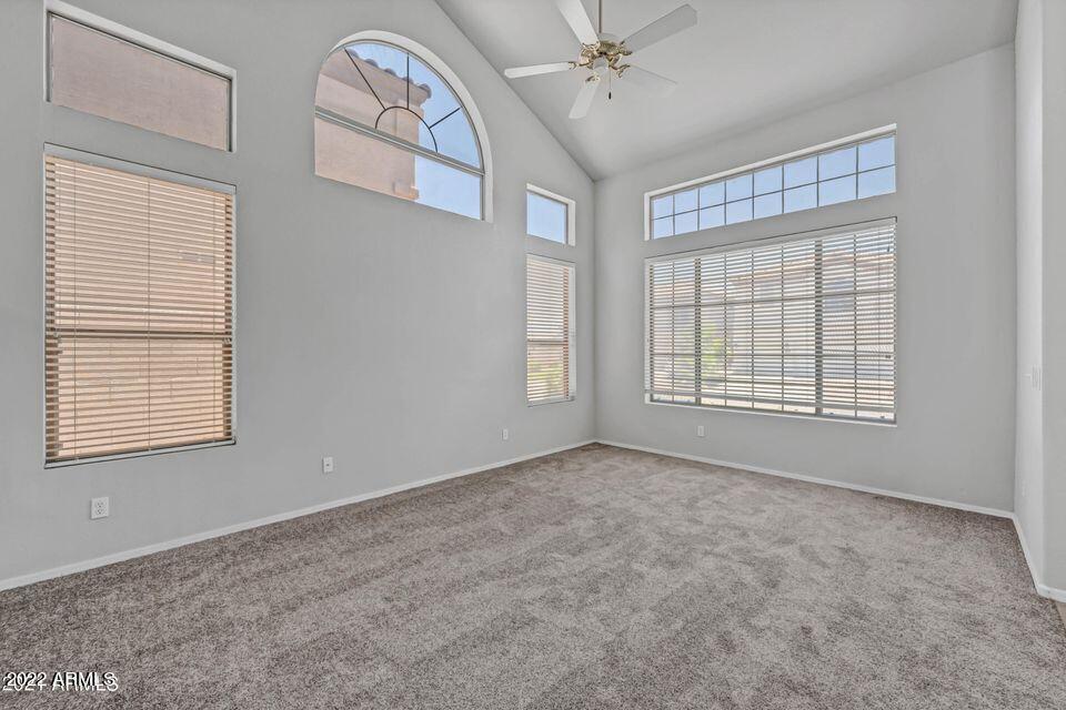 6410 West Hackamore Drive Phoenix, AZ 85083 - Photo 8 of 50 a view of an empty room with a window