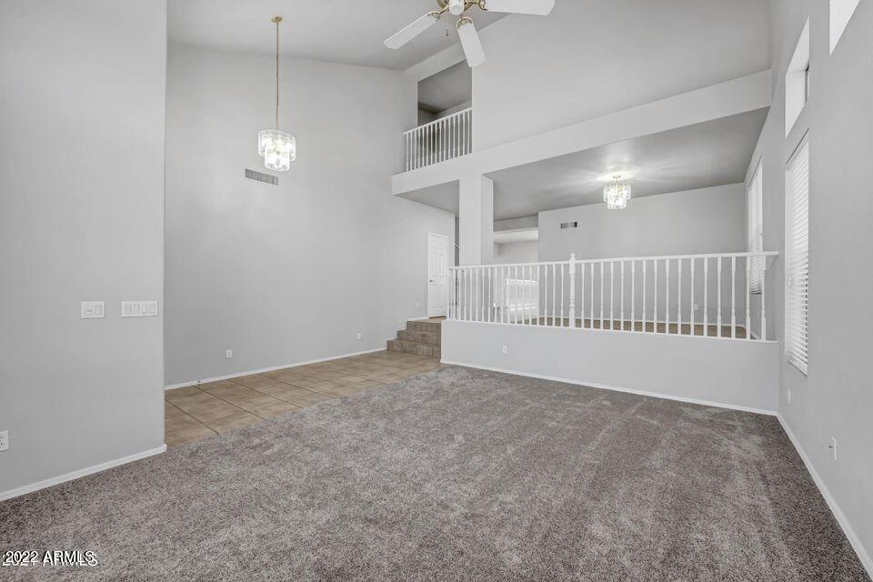 6410 West Hackamore Drive Phoenix, AZ 85083 - Photo 10 of 50 a view of an empty room with a window