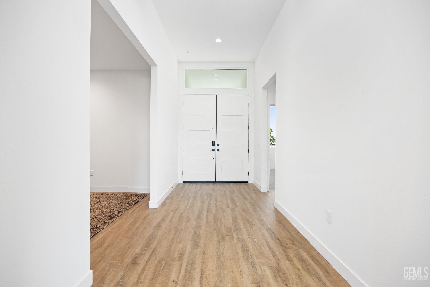 Undisclosed Address Bakersfield, CA 93314 - Photo 14 of 36 a view of a room with wooden floor and closet