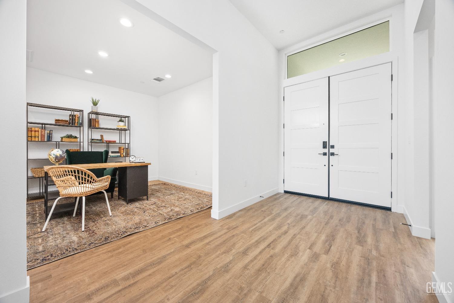 Undisclosed Address Bakersfield, CA 93314 - Photo 15 of 36 an empty room with furniture and wooden floor