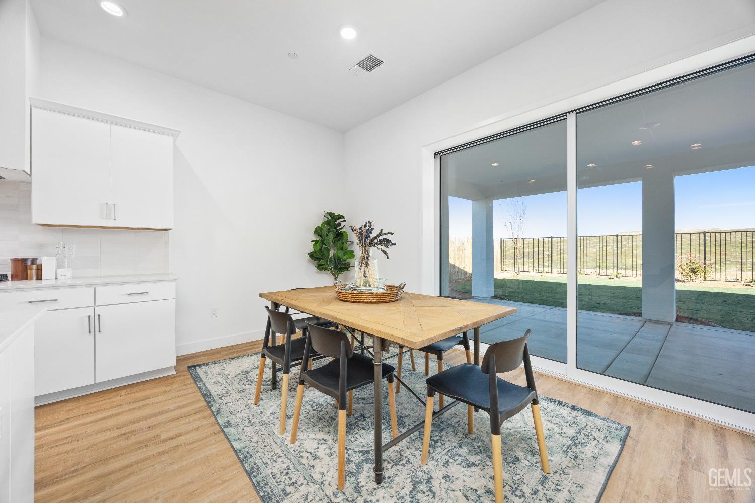 Undisclosed Address Bakersfield, CA 93314 - Photo 30 of 36 a view of a dining room with furniture