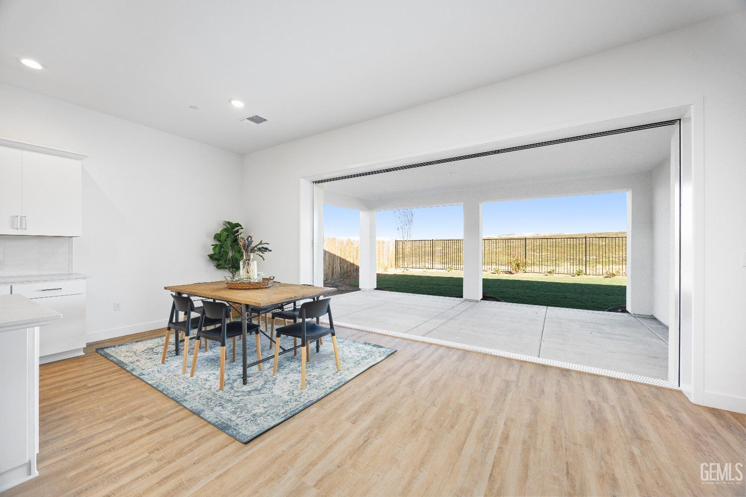 Undisclosed Address Bakersfield, CA 93314 - Photo 32 of 36 a view of a livingroom with furniture window and wooden floor