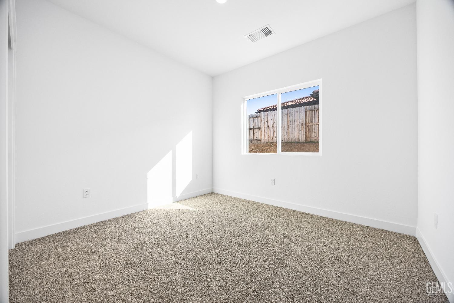Undisclosed Address Bakersfield, CA 93314 - Photo 9 of 36 an empty room with a window