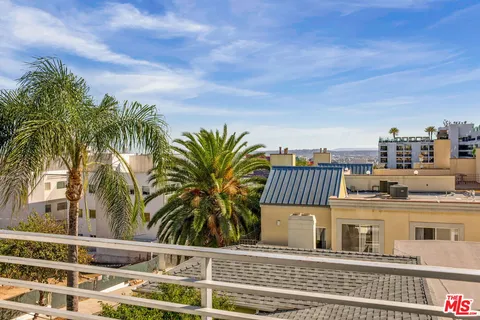 a view of a city with tall buildings